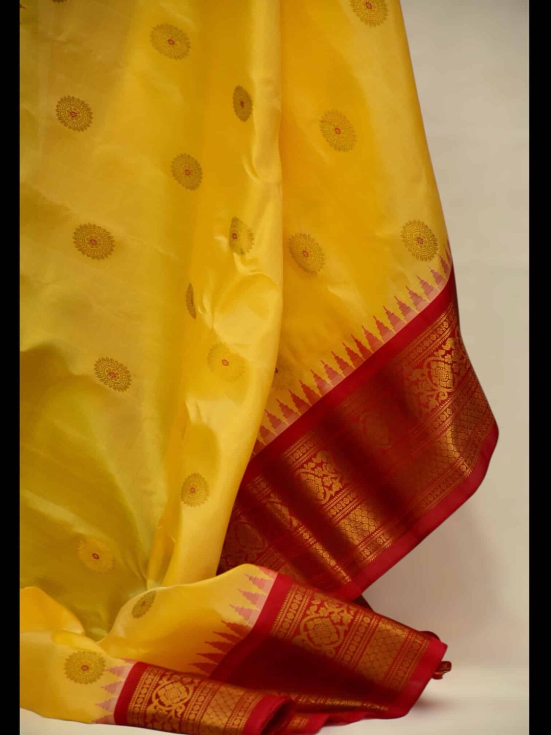 Creamish Yellow Silk Gadwal Saree | Pinoish Red Pallu & Meena Butta Work