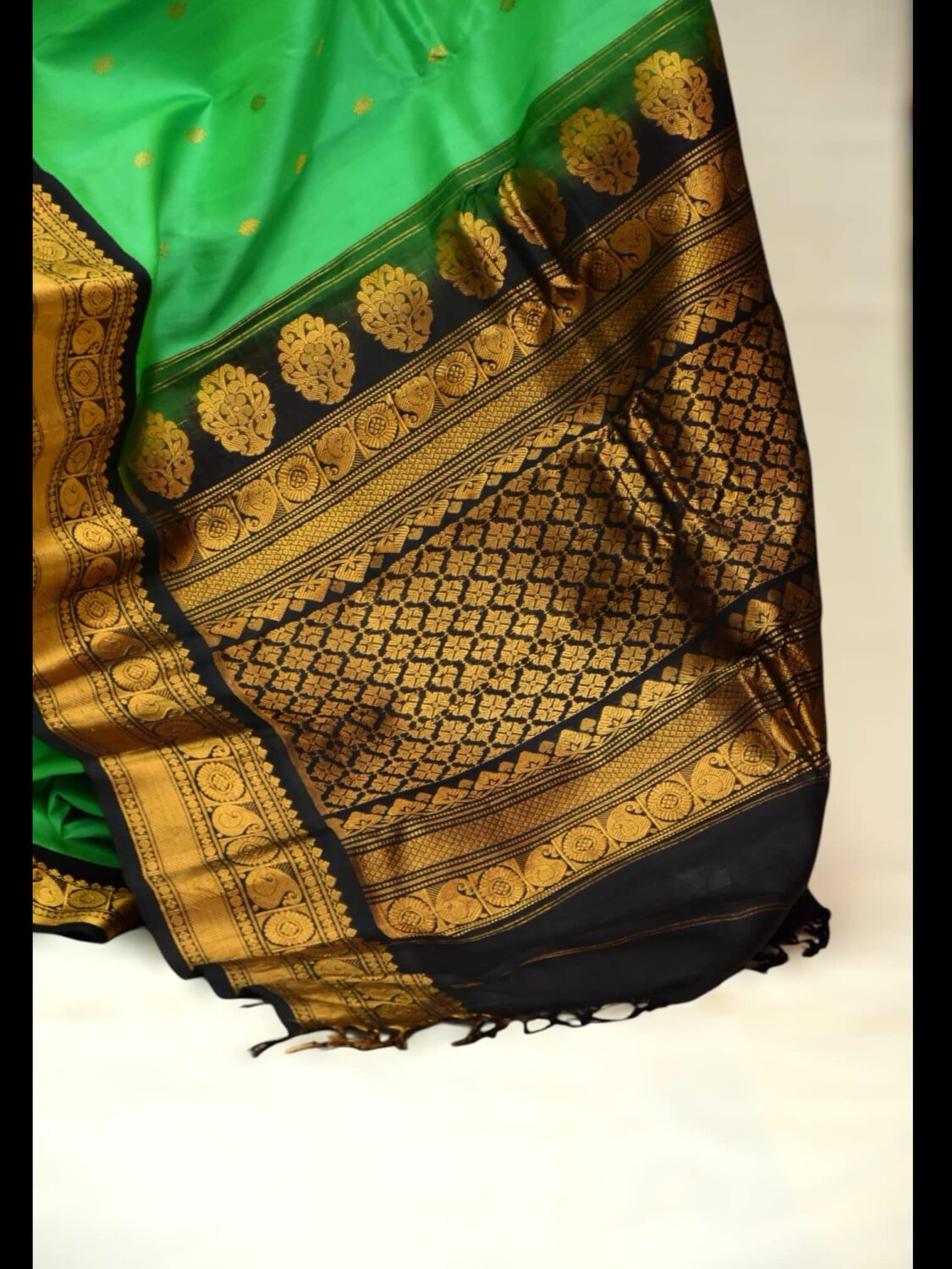 Parrot Green Pure Silk Saree | Black Border & Intricate Work