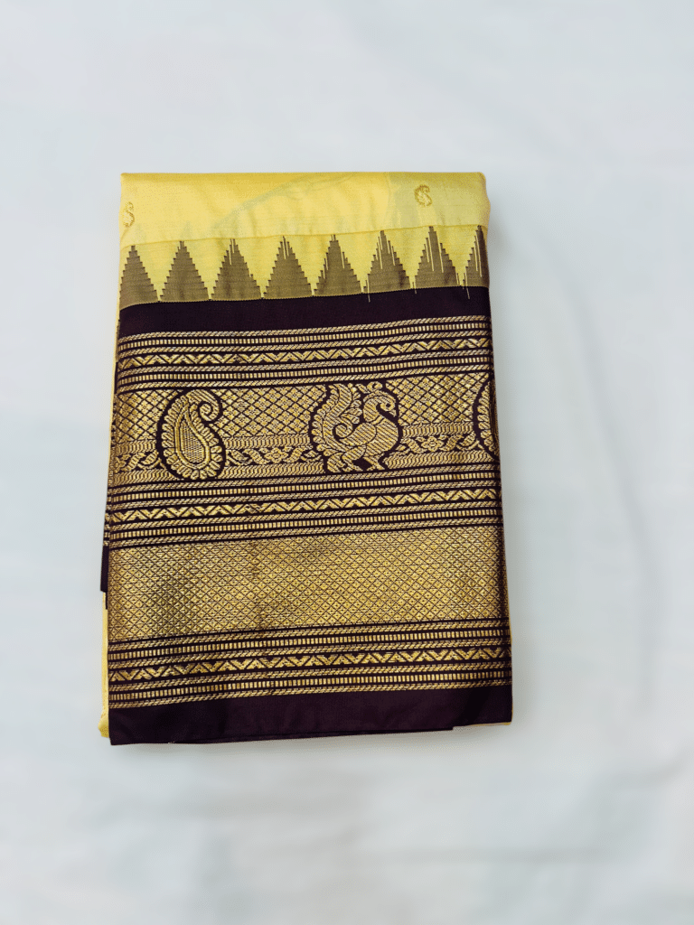 Pastel Yellow Premium Semi Gadwal Saree with Wine Temple Kuttu Border - close-up detail