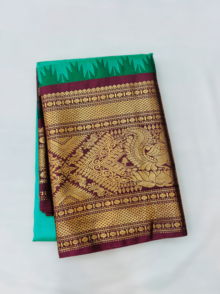Sea Green Semi Gadwal Saree with Maroon Temple Kuttu Border and Meena Butta