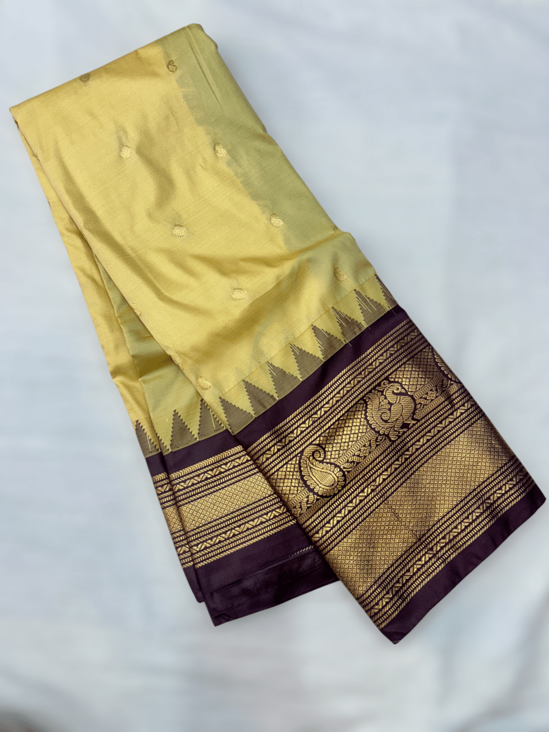 Pastel Yellow Premium Semi Gadwal Saree with Wine Temple Kuttu Border & Gold Buttas