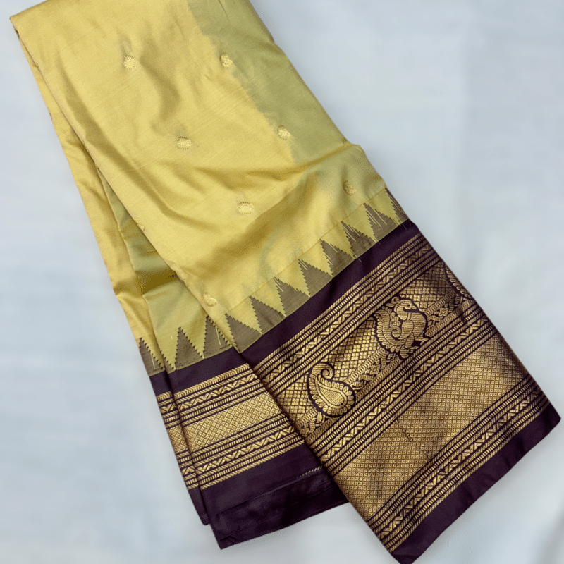 Pastel Yellow Premium Semi Gadwal Saree with Wine Temple Kuttu Border and Gold Buttas