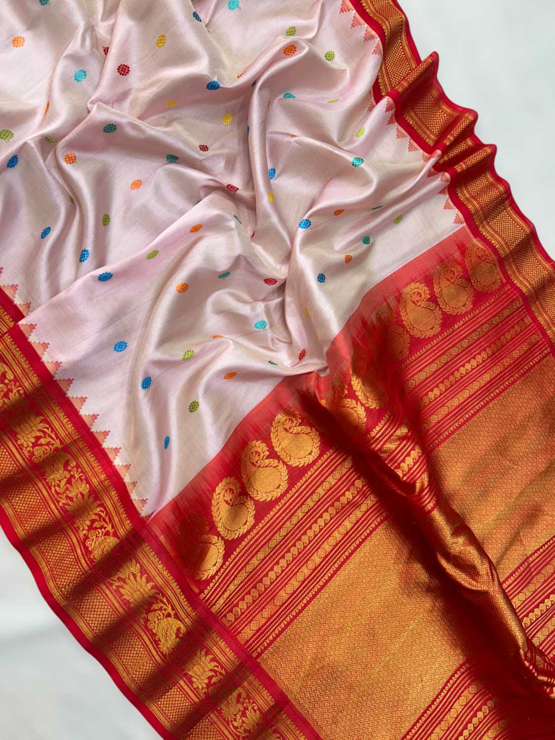 Baby Pink Pure Handloom Silk Gadwal Saree with Red Kuttu Border & Multicolor Butta