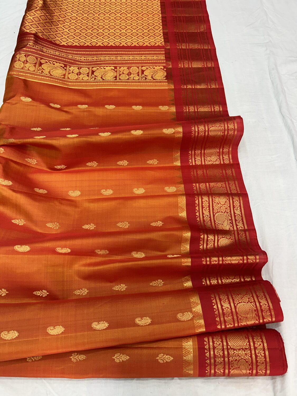 Mustard Orange Pure Silk Handloom Gadwal Pattu Saree with Red Contrast Border and Blouse