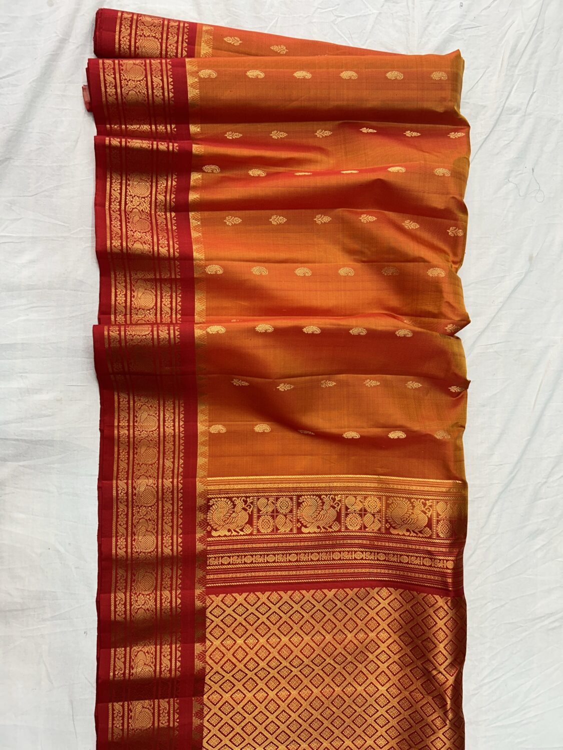 Mustard Orange Pure Silk Handloom Gadwal Pattu Saree with Red Contrast Border and Blouse