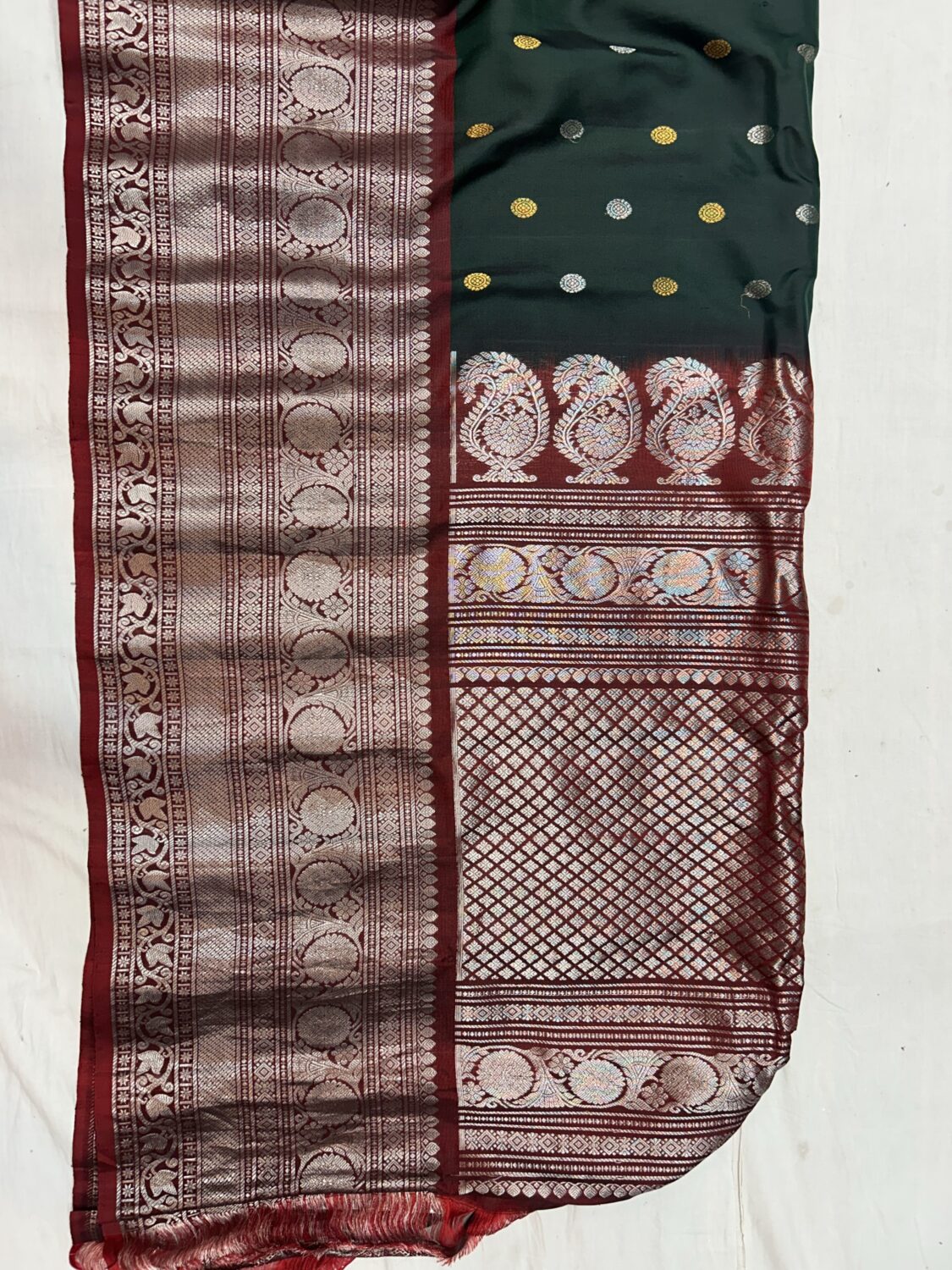 Bottle Green Handloom Pure Silk Gadwal Saree with Maroon Silver Zari Border