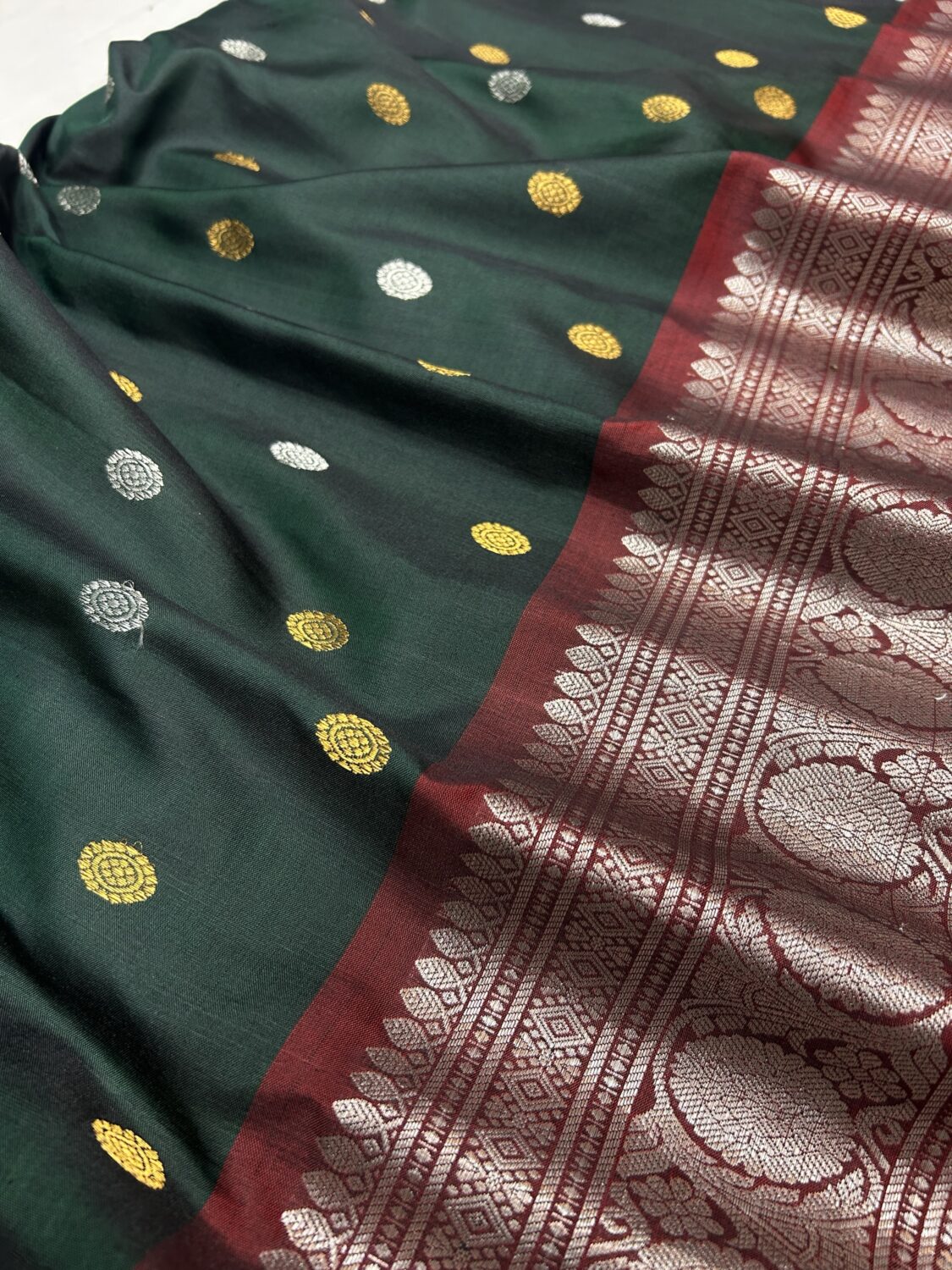 Bottle Green Handloom Pure Silk Gadwal Saree with Maroon Silver Zari Border